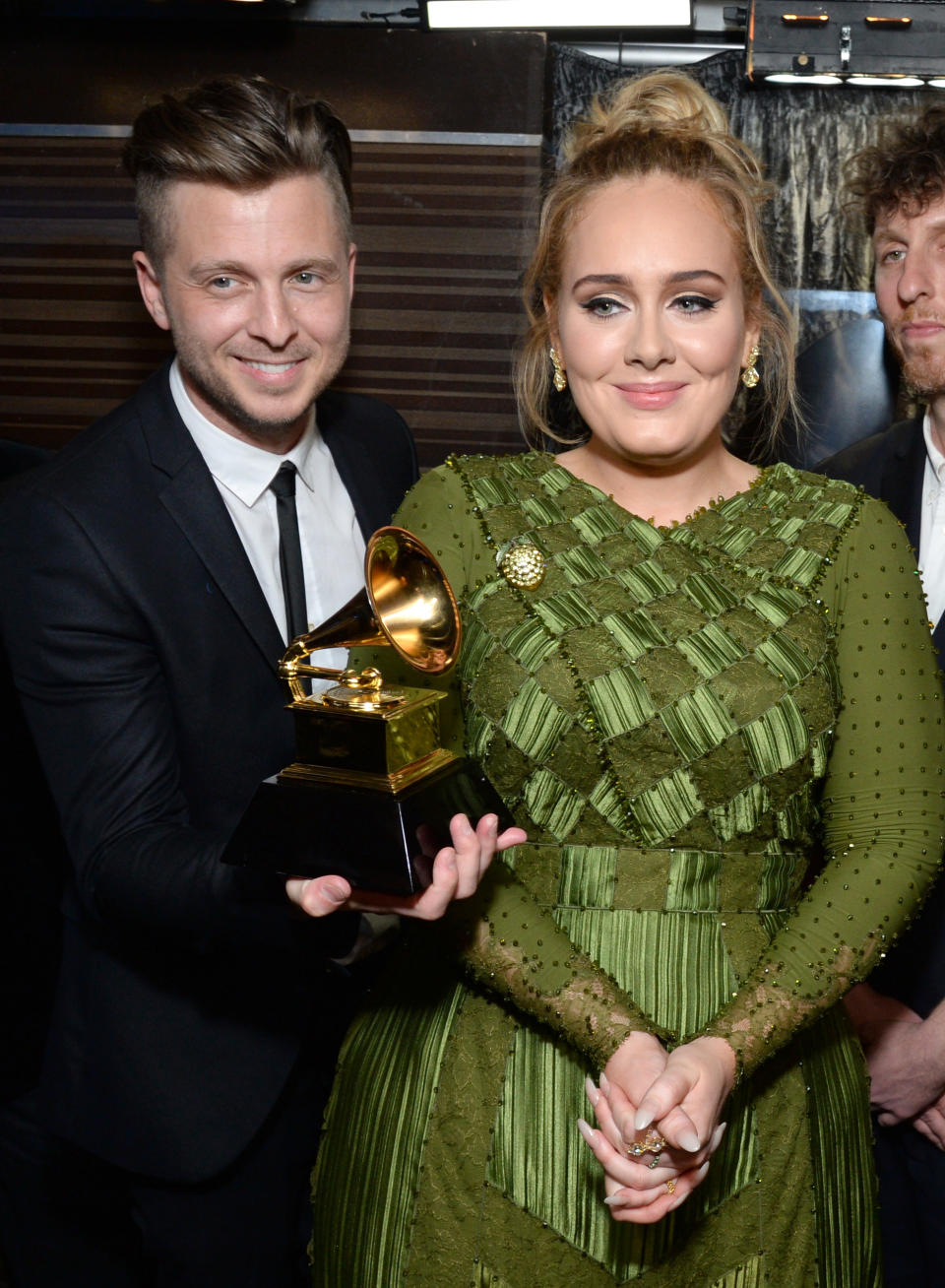 LOS ANGELES, CA - FEBRUARY 12:  Recording artist-producer Ryan Tedder (L) and recording artist Adele, co-recipients of the Album Of The Year award for '25,' pose backstage during the The 59th GRAMMY Awards at STAPLES Center on February 12, 2017 in Los Angeles, California.  (Photo by Michael Kovac/Getty Images for NARAS)