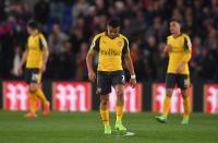 <p>Alexis Sanchez looks despondent after Arsenal fall behind</p>