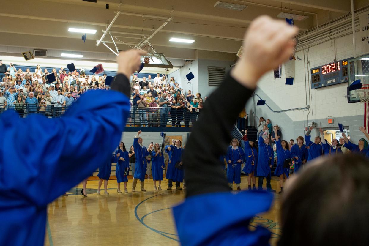 Graduates from Culleoka Unit School throw their caps into the air ending their commencement ceremony held inside the school gymnasium in Culleoka Tenn., on Monday, May 24, 2021.