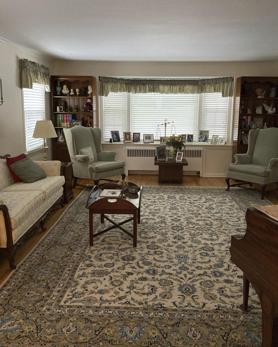 This photo provided by Anne D'Innocenzio shows the living room of her childhood home, in suburban New Jersey. Her mother, Marie D'Innocenzio, passed away in February 2023, after a brief battle with cancer. D'Innocenzio quickly recognized that she had to focus on keeping her most beloved belongings, while providing a home for other items that reflected her spirit. (Anne D'Innocenzio via AP)