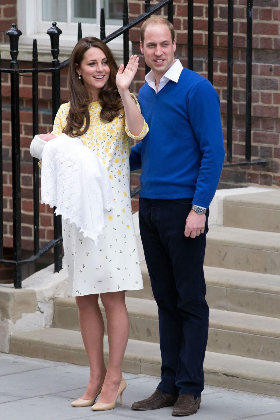 <p>Welcoming Princess Charlotte to the public, Kate chose a bespoke Jenny Packham dress complete with a sweet buttercup print. She paired the look with nude Jimmy Choo pumps. </p><p><i>[Photo: PA]</i></p>