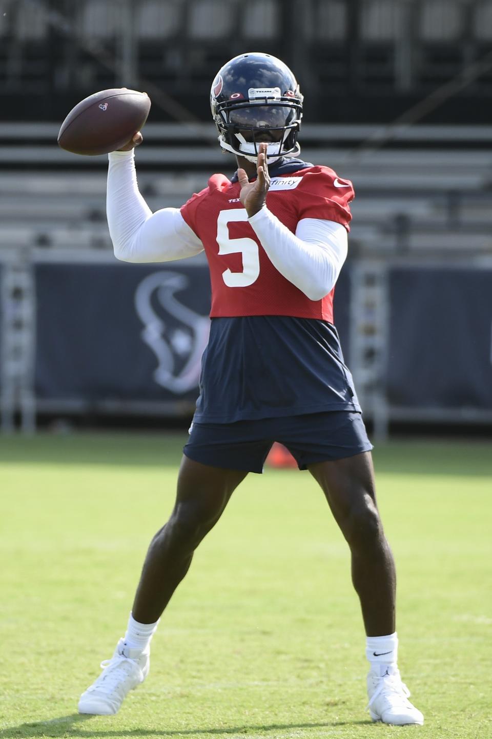 Texans quarterback Tyrod Taylor (5) throws the ball during NFL football practice Thursday, July 29, 2021, in Houston. (AP Photo/Justin Rex)
