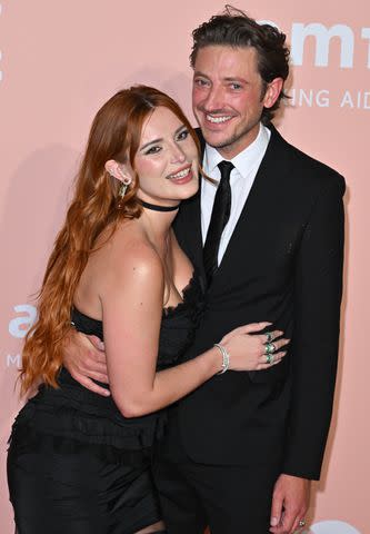 <p>Stephane Cardinale - Corbis/Corbis via Getty</p> Bella Thorne says she and fiancé Mark Emmas are "big cuddle bugs"