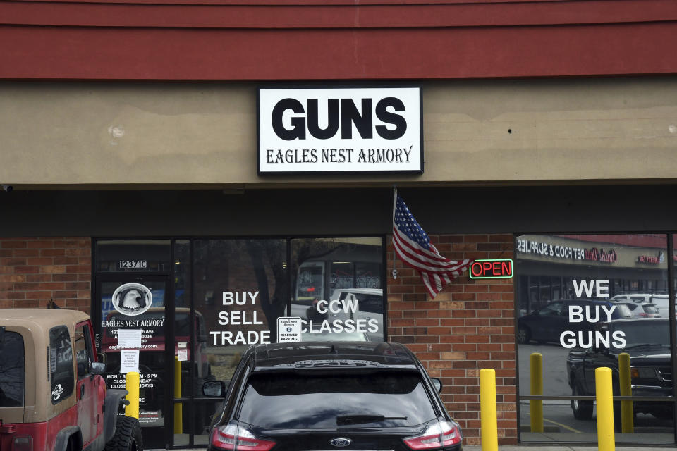 The front of the Eagles Nest Armory gun shop is seen Friday, March 26, 2021, in Arvada, Colo. The suspect in the Colorado supermarket shootings bought a firearm at the local gun store after passing a background check, and he also had a second weapon with him that he didn't use in the attack that killed 10 people this week, authorities and the gun store owner said Friday. (AP Photo/Thomas Peipert)