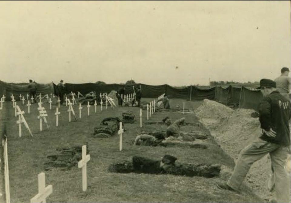 German POW exhume graves