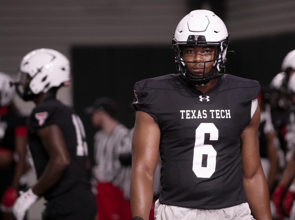 Texas Tech coaches have high expectations for defensive end Myles Cole (6), who takes over the position vacated by first-round draft choice Tyree Wilson.