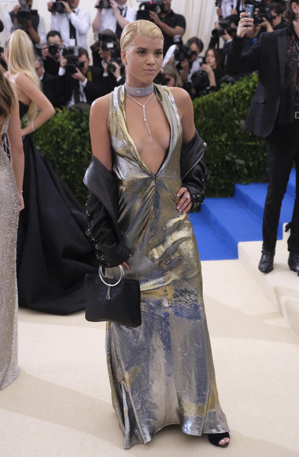 <p>The 18-year-old daughter of singer Lionel Richie wore a silver Topshop gown with a plunging neckline to the 2017 Met Gala. She completed her look with a leather jacket. (Photo by Charles Sykes/Invision/AP) </p>