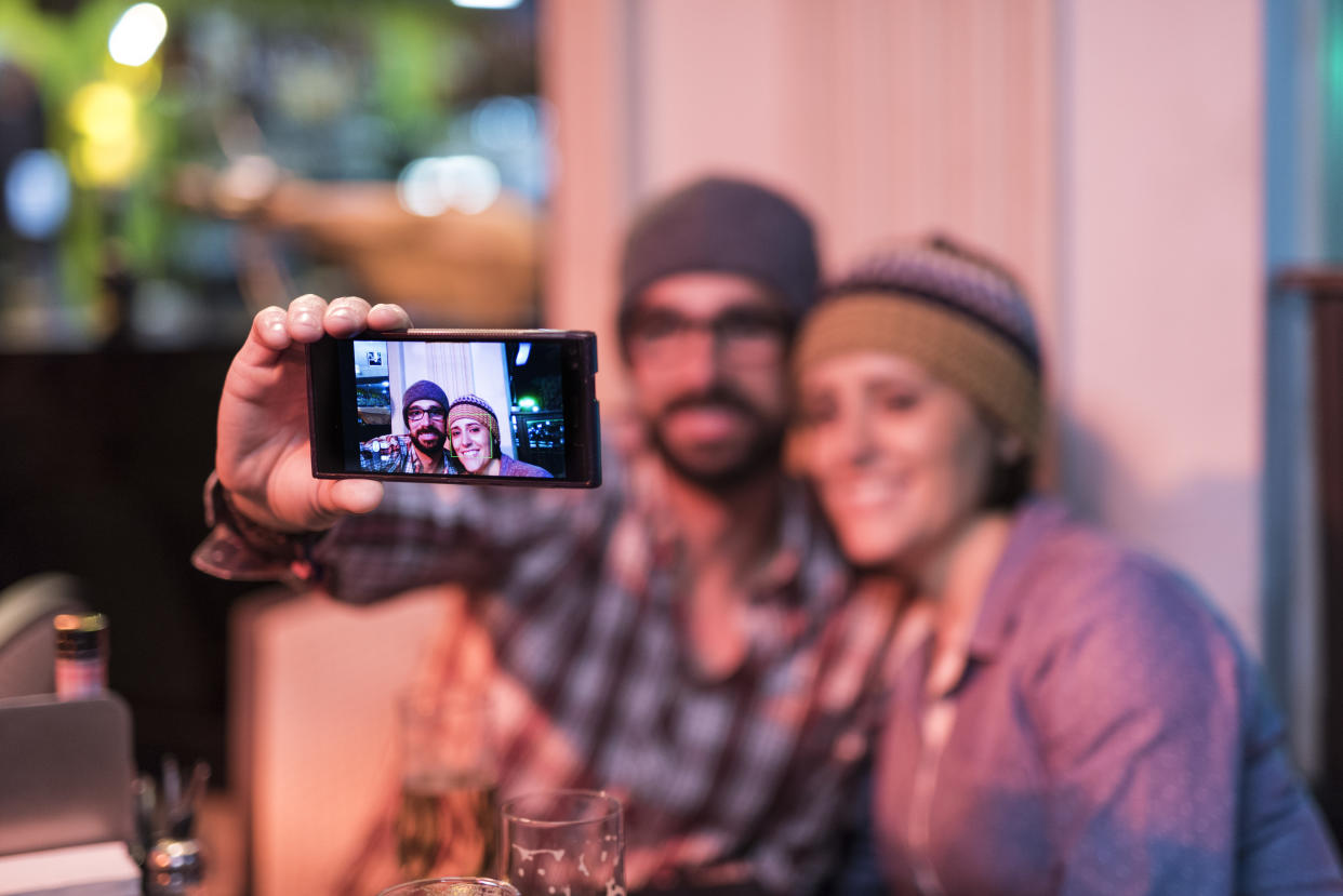 &ldquo;She&rsquo;s out of my league, but I'm so glad I messaged her anyway." (Photo: Westend61 via Getty Images)