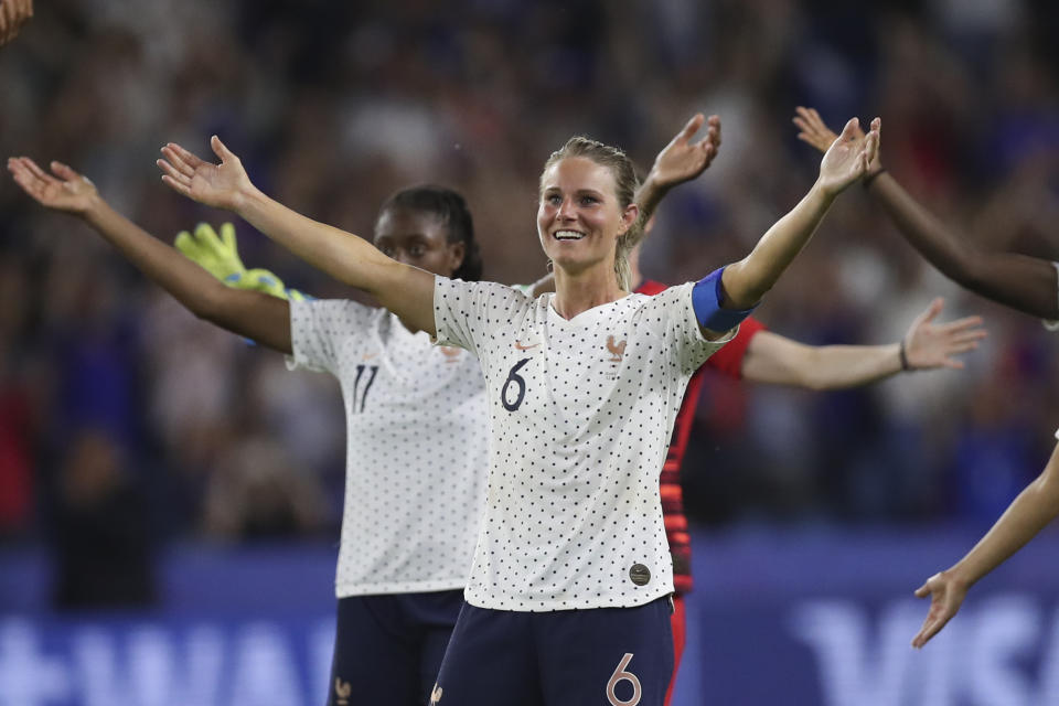 France's Amandine Henry celebrates at the end of the Women's World Cup round of 16 soccer match between France and Brazil at the Oceane stadium in Le Havre, France, Sunday, June 23, 2019. France beat Brazil 2-1. (AP Photo/Francisco Seco)