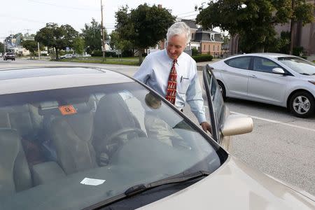 U.S. Senate candidate Jim Rubens (R-NH) gets into his car to head toward a campaign appointment in Concord, New Hampshire, August 5, 2014. Picture taken August 5, 2014. REUTERS/Dominick Reuter