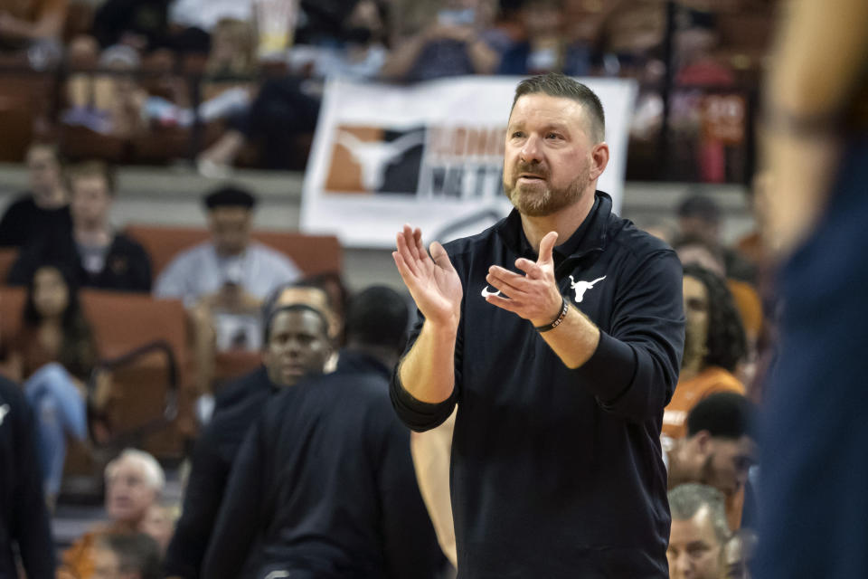 Texas head coach Chris Beard claps for his team during the first half of an NCAA college basketball game against California Baptist, Wednesday, Nov. 24, 2021, in Austin, Texas. (AP Photo/Michael Thomas)