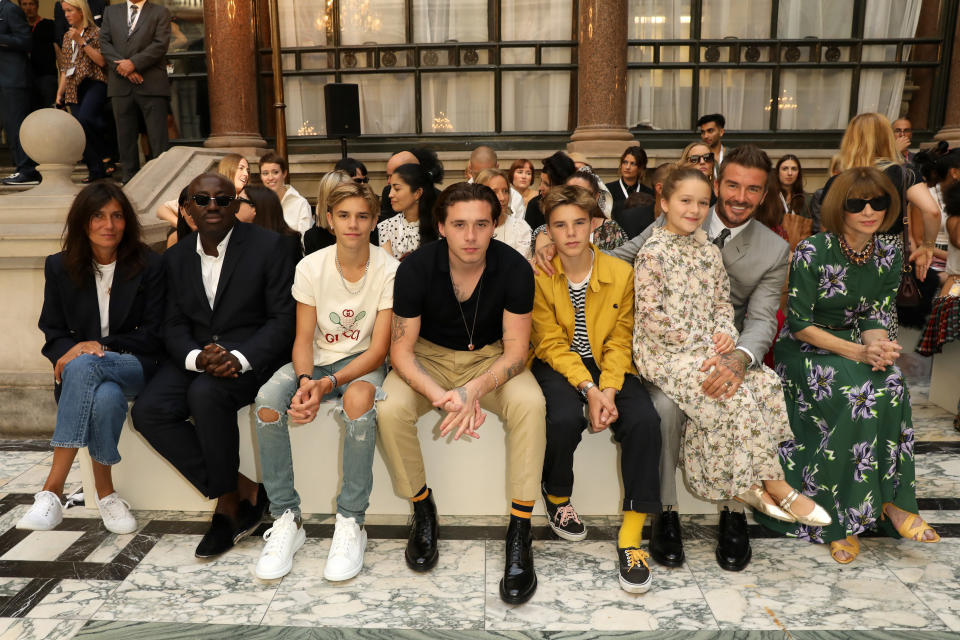 (L-R) Emmanuelle Alt, Edward Enninful, Romeo Beckham, Brooklyn Beckham, Cruz Beckham, Harper Beckham, David Beckham and Anna Wintour attend the Victoria Beckham show during London Fashion Week September 2019 at British Foreign and Commonwealth Office on September 15, 2019 in London, England. (Photo by Darren Gerrish/WireImage)