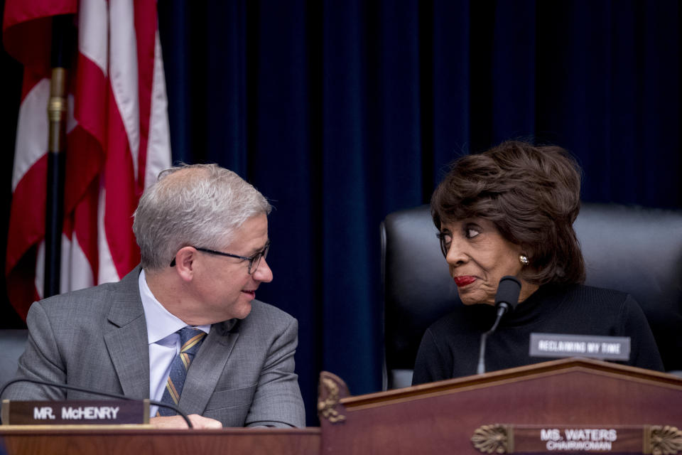 Ranking Member Rep. Patrick McHenry, R-N.C., left, and Chairwoman Rep. Maxine Waters, D-Calif., speak together before Facebook CEO Mark Zuckerberg arrives for a House Financial Services Committee hearing on Capitol Hill in Washington, Wednesday, Oct. 23, 2019, on Facebook's impact on the financial services and housing sectors. (AP Photo/Andrew Harnik)