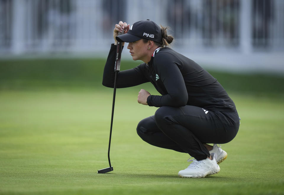 Linn Grant, of Sweden, lines up a putt on the 18th hole during the first round of the LPGA CPKC Women's Open golf tournament in Vancouver, British Columbia, Thursday, Aug. 24, 2023. (Darryl Dyck/The Canadian Press via AP)