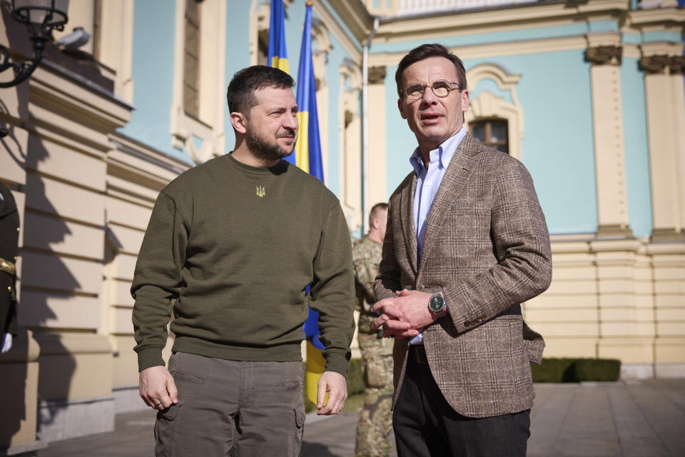 Swedish Prime Minister Ulf Kristersson, right, and Ukrainian President Volodymyr Zelenskyy talk during their meeting in Kyiv, Ukraine, Wednesday, Feb. 15, 2023. (Ukrainian Presidential Press Office via AP)