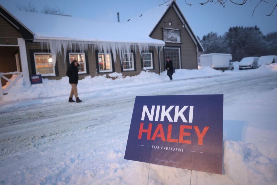 Icicles hang from the roof as people arrive for a campaign event held by Republican presidential candidate Nikki Haley at the Thunder Bay Grille on Jan. 13, 2024, in Davenport, Iowa. Iowa Republicans will be the first to select their party's nominee for the 2024 presidential race when they caucus on Jan. 15, 2024.