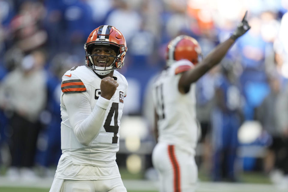 Cleveland Browns quarterback Deshaun Watson (4) celebrates after a touchdown run by teammate Jerome Ford during the first half of an NFL football game against the Indianapolis Colts, Sunday, Oct. 22, 2023, in Indianapolis. (AP Photo/Michael Conroy)