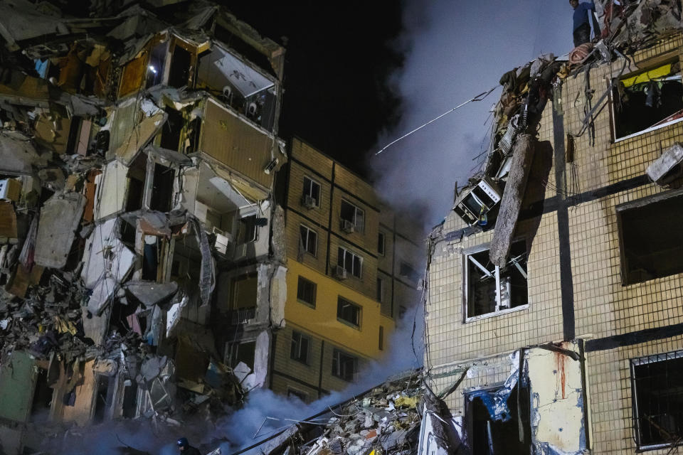 A high-rise residential building lies partially destroyed after a missile strike on Jan. 14, 2023 in Dnipro, Ukraine.  / Credit: Yurii Stefanyak/Global Images Ukraine via Getty Images