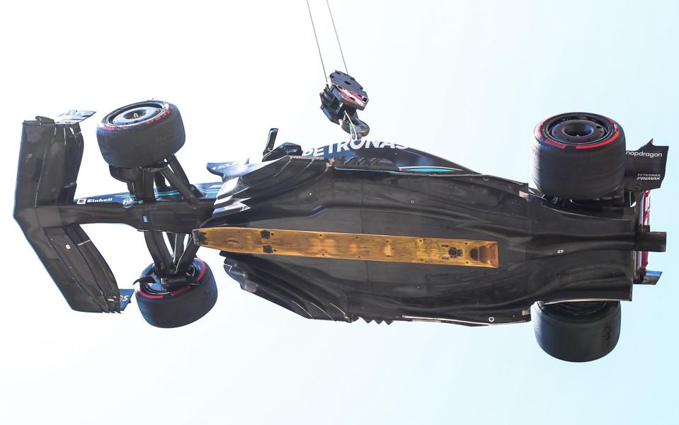 The car of Lewis Hamilton of Mercedes is lifted on a crane after he crashed during final practice ahead of the F1 Grand Prix of Monaco at Circuit de Monaco - Getty Images/Eric Alonso