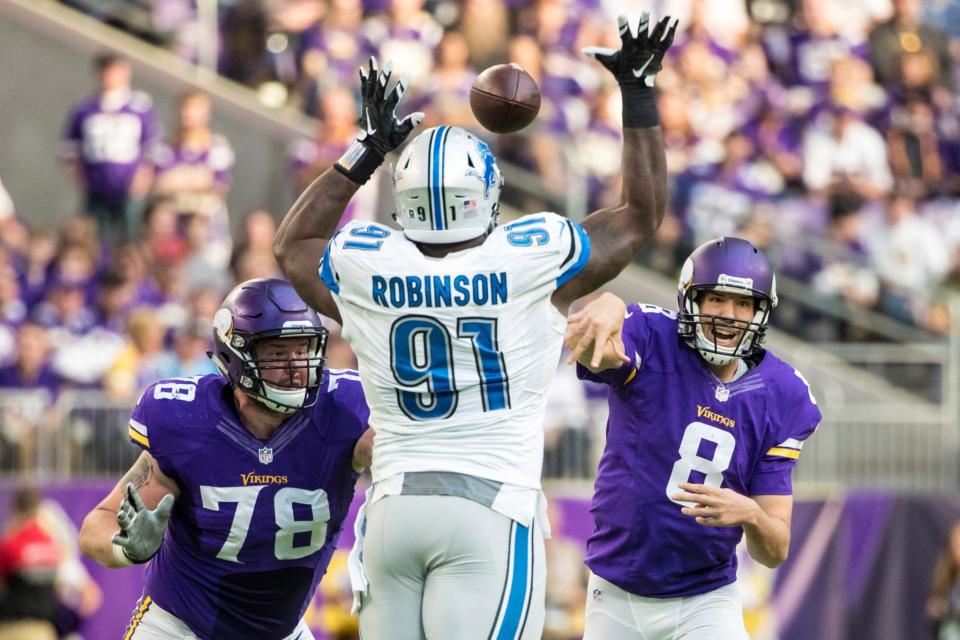 <p>Minnesota Vikings quarterback Sam Bradford (8) throws over Detroit Lions defensive tackle A’Shawn Robinson (91) during the third quarter at U.S. Bank Stadium. The Lions defeated the Vikings 22-16. Mandatory Credit: Brace Hemmelgarn-USA TODAY Sports </p>