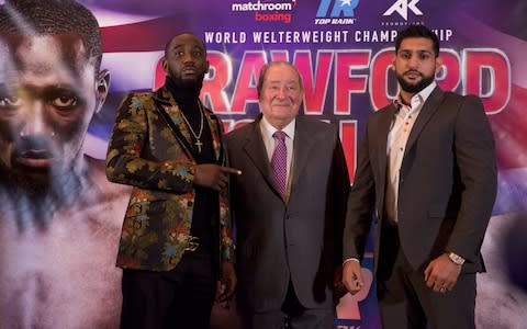 Bob Arum with Amir Khan and Terence Crawford - Credit: PA