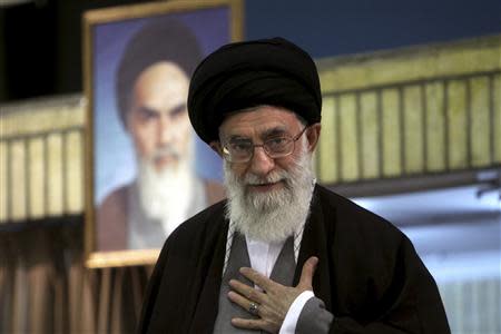 Iran's Supreme Leader Ayatollah Ali Khamenei greets clerics during a meeting in Tehran in this December 13, 2009 file photo. REUTERS/Khamenei.ir/Handout/Files