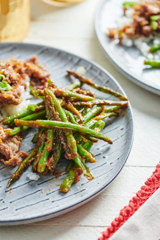 <p>Courtesy of Katie Workman</p><p>A simple miso-infused butter turns a pile of fresh green beans into an umami bomb.</p><p><strong>Get the Recipe: <a href="https://themom100.com/recipe/blistered-green-beans-with-miso-butter/" rel="nofollow noopener" target="_blank" data-ylk="slk:Blistered Green Beans with Miso Butter;elm:context_link;itc:0;sec:content-canvas" class="link rapid-noclick-resp">Blistered Green Beans with Miso Butter</a></strong></p>