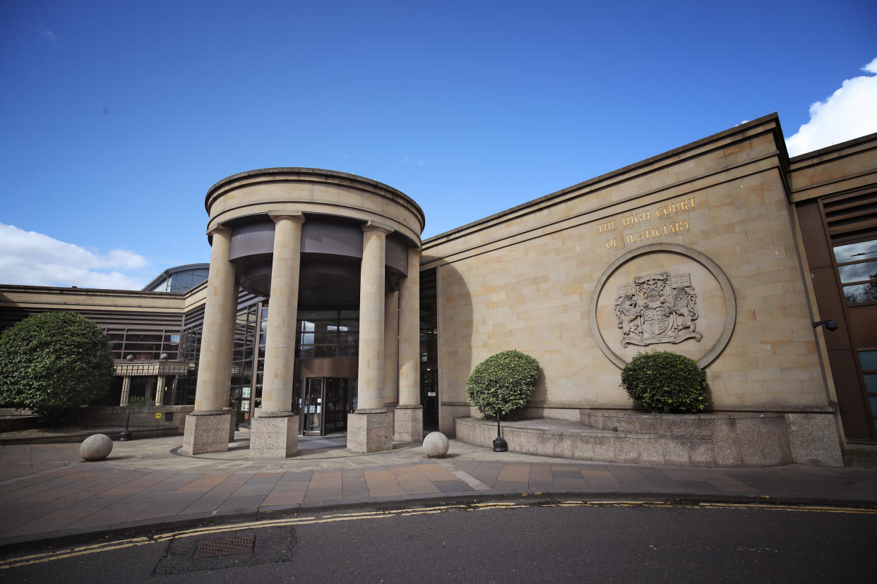 File photo dated 14/06/19 of the High Court, Glasgow. A man convicted of assaulting a toddler by putting her in a tumble dryer will be sentenced on Thursday.