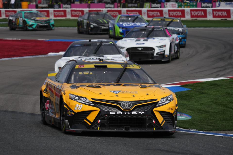 Christopher Bell, front, races during the 2022 Bank of America ROVAL 400 at Charlotte Motor Speedway.