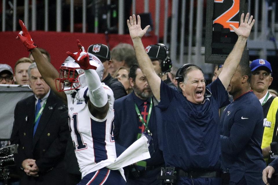 New England Patriots' Duron Harmon (21) and head coach Bill Belichick celebrate after the NFL Super Bowl 53 football game against the Los Angeles Rams Sunday, Feb. 3, 2019, in Atlanta. The Patriots won 13-2. (AP Photo/Patrick Semansky)