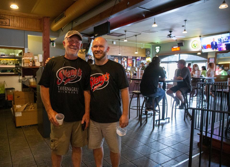 Owners of Steny’s Tavern & Grill, Jerry Steny, left, and Ryan Steny pose, for a portrait in 2020,