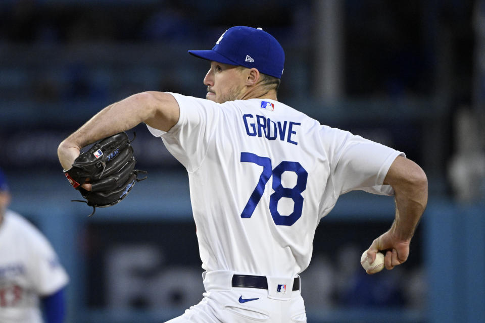 Los Angeles Dodgers starting pitcher Michael Grove throws to the plate during the first inning of a baseball game against the Colorado Rockies Monday, April 3, 2023, in Los Angeles. (AP Photo/Mark J. Terrill)