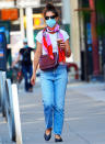 <p>Katie Holmes enjoys an iced coffee as she heads out to meet a friend in New York City on Wednesday.</p>