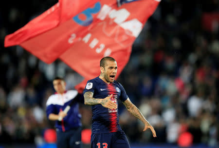 Soccer Football - Ligue 1 - Paris St Germain v AS Monaco - Parc des Princes, Paris, France - April 21, 2019 Paris St Germain's Dani Alves celebrates after the match REUTERS/Gonzalo Fuentes