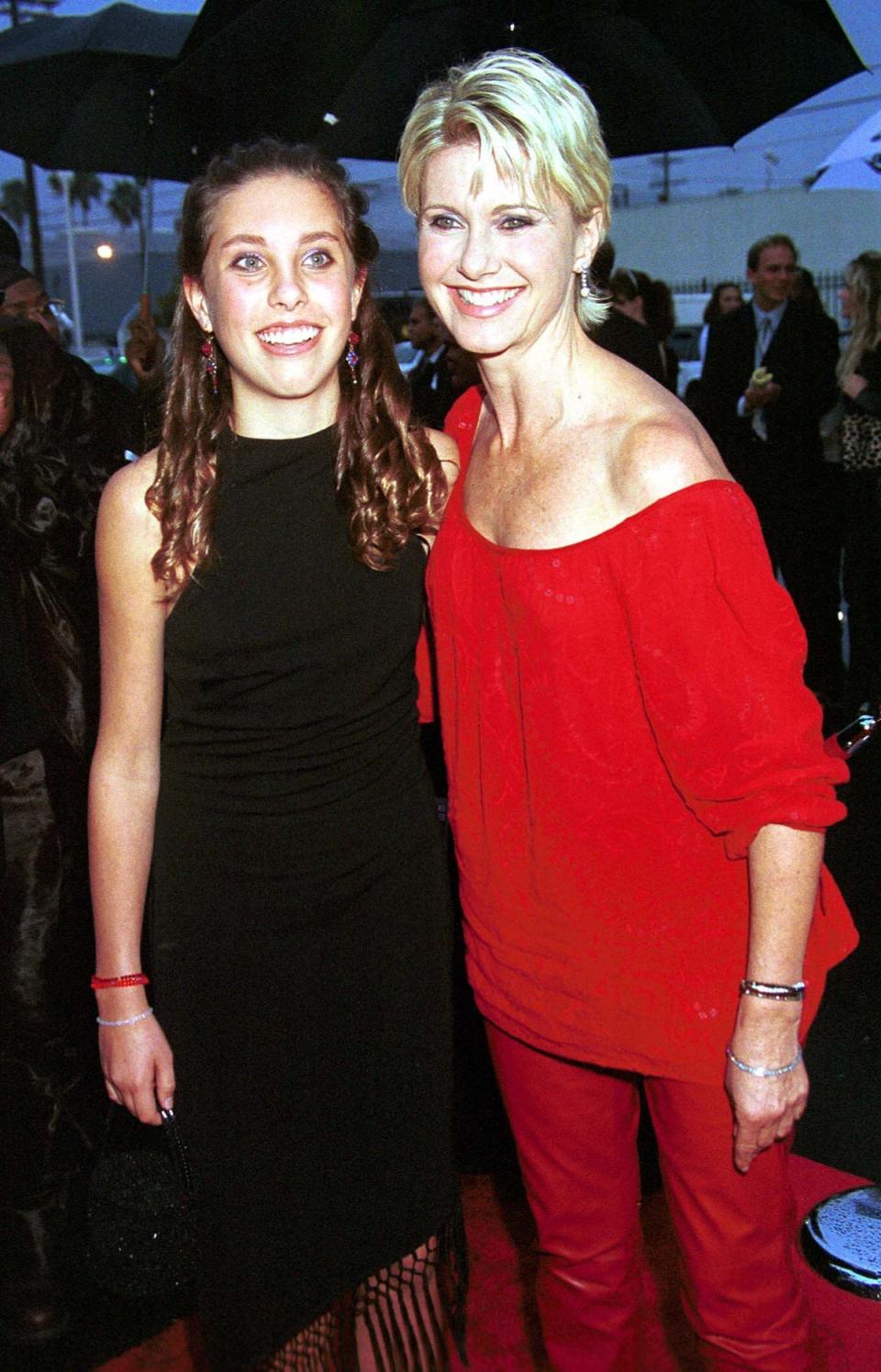 The star pictured with her mother in 2000, prior to her procedures (AFP via Getty Images)