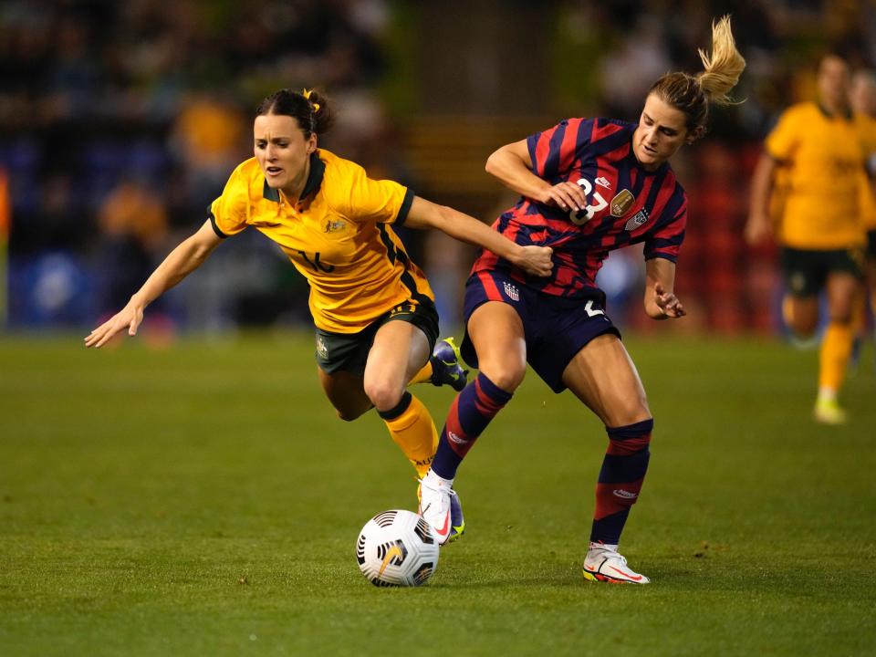 Emily Fox wins a tackle against Australia's Hayley Raso.