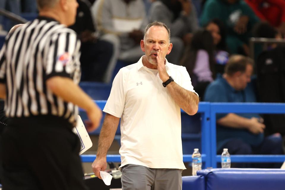 Palo Dura’s Coach Jeff Evans speaks to the referee in a District 3-5A game against Caprock, Friday, January 20, 2023, at Palo Duro High School in Amarillo.  Palo Duro won 83-46.