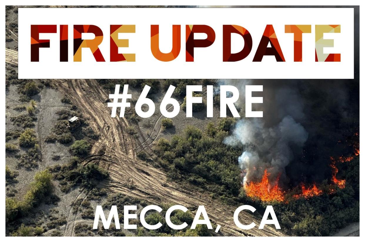 Several agencies were fighting a vegetation fire that began Monday near Mecca.