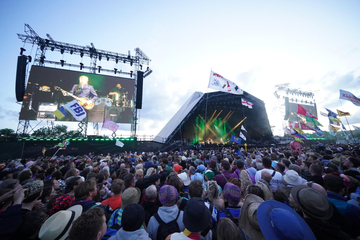 EDITORIAL USE ONLY. NO ARCHIVING. PLEASE NOTE MANDATORY RESTRICTIONS APPLY: 1) This photograph may only be used until July 23, 2022. 2) This photograph may only be used in context with the Glastonbury Festival 2022. Paul McCartney performing on the Pyramid Stage during the Glastonbury Festival at Worthy Farm in Somerset. Picture date: Saturday June 25, 2022.