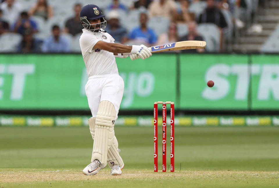 India's Ajinkya Rahane bats during play on day two of the second cricket test between India and Australia at the Melbourne Cricket Ground, Melbourne, Australia, Sunday, Dec. 27, 2020. (AP Photo/Asanka Brendon Ratnayake)