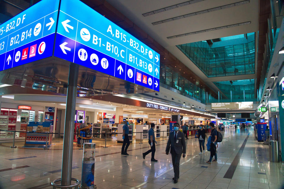 Dubai International Airport's Terminal 3, typically buzzing with passengers, stands largely empty in Dubai, United Arab Emirates, Wednesday, June 10, 2020. The coronavirus pandemic has hit global aviation hard, particularly at Dubai International Airport, the world's busiest for international travel, due to restrictions on global movement over the virus. (AP Photo/Jon Gambrell)