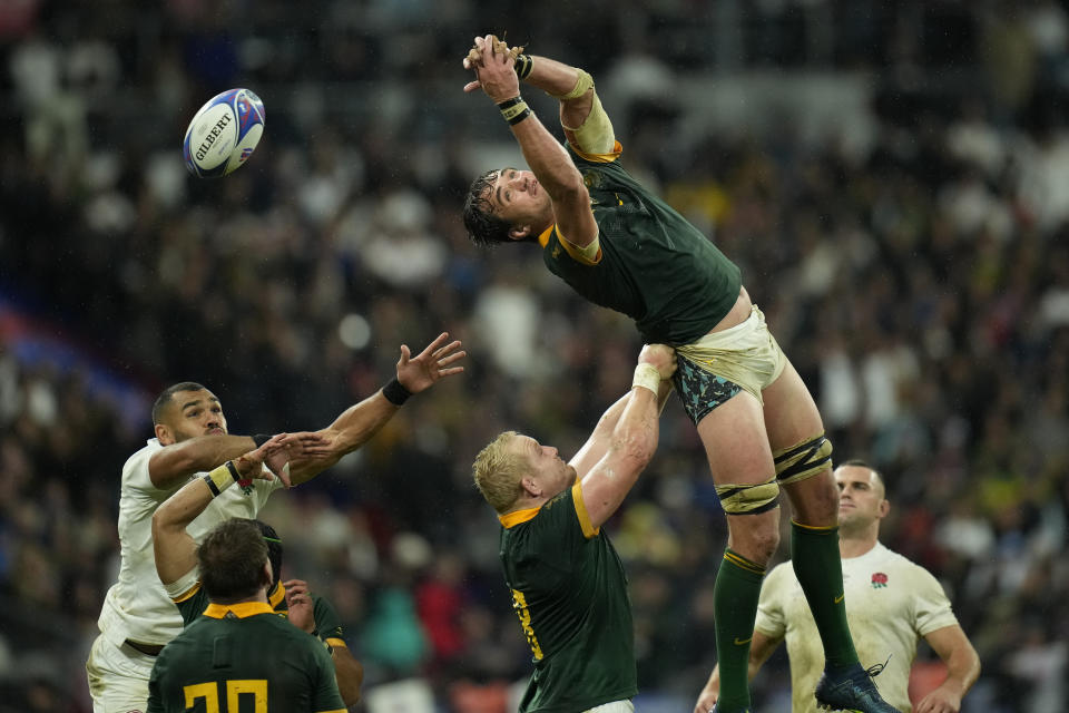 South Africa's Franco Mostert fails to collect the ball in a line out during the Rugby World Cup semifinal match between England and South Africa at the Stade de France in Saint-Denis, outside Paris, Saturday, Oct, 21, 2023. (AP Photo/Christophe Ena)