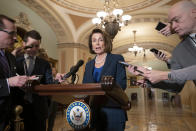 House Democratic Leader Nancy Pelosi of California, the speaker-designate for the new Congress in January, talks to reporters after meeting with Senate Minority Leader Chuck Schumer, D-N.Y., as Congress and President Donald Trump bicker over his demand that lawmakers fund a wall along the U.S.-Mexico border, pushing the government to the brink of a partial shutdown, in Washington, Tuesday, Dec. 18, 2018. Without a resolution, parts of the federal government will shut down at midnight Friday. (AP Photo/J. Scott Applewhite)