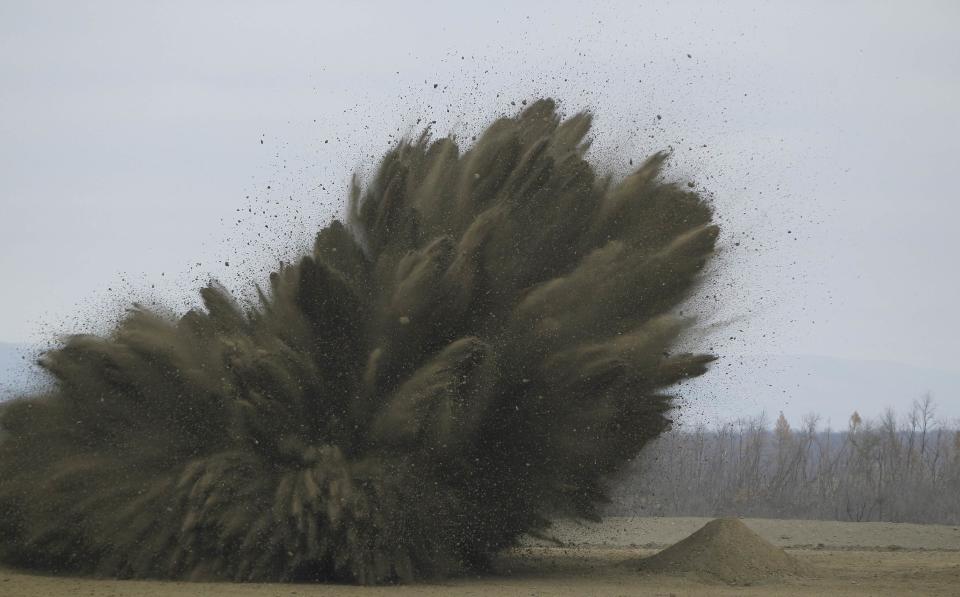 Munitions are destroyed in a controlled blast at the U.S. Army Letterkenny Munitions Center in Chambersburg, Pennsylvania