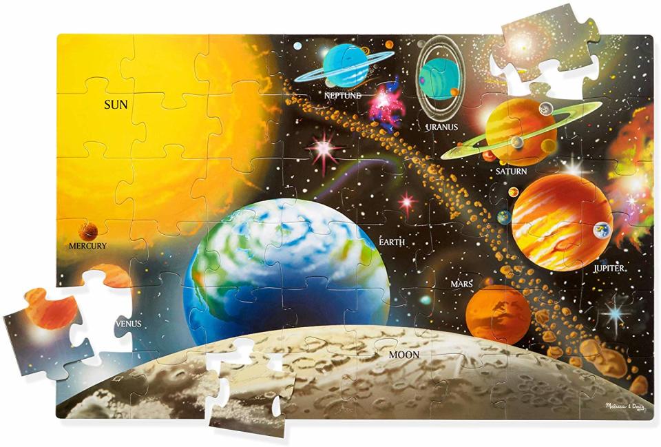 Teach kids all about out space with this puzzle. (Photo: Amazon)