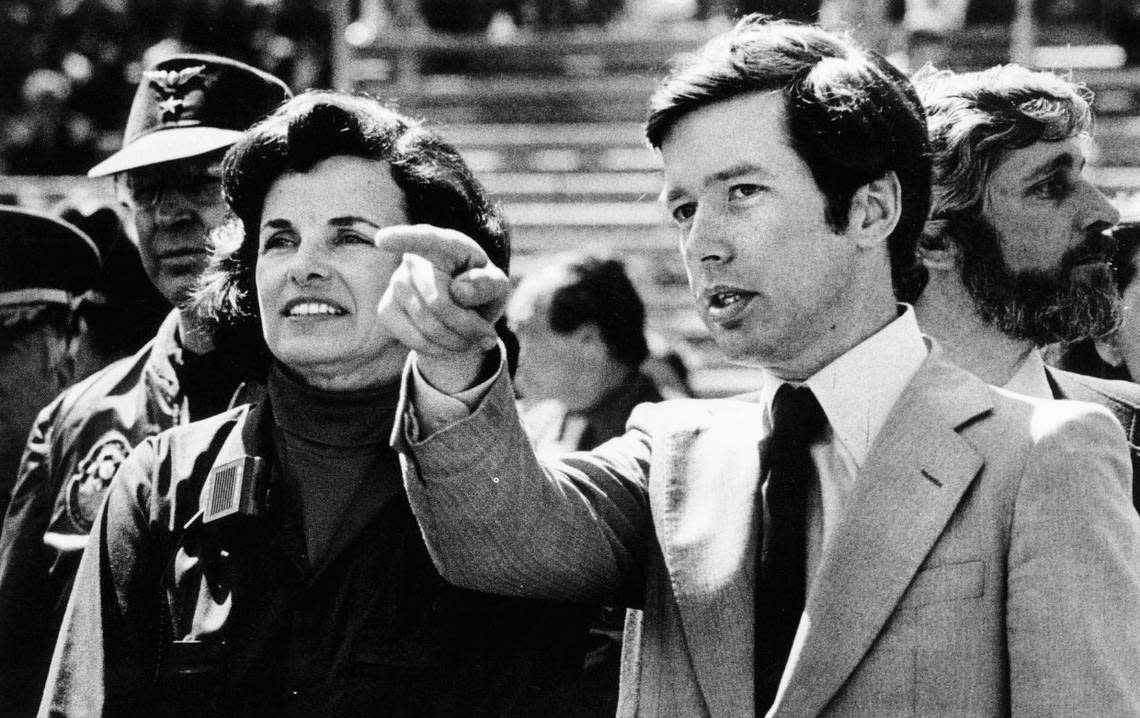 Then-San Francisco Mayor Dianne Feinstein and Gray Davis, then chief of staff for Gov. Jerry Brown, survey an evacuation site at Golden Gate Park on April 18, 1980.