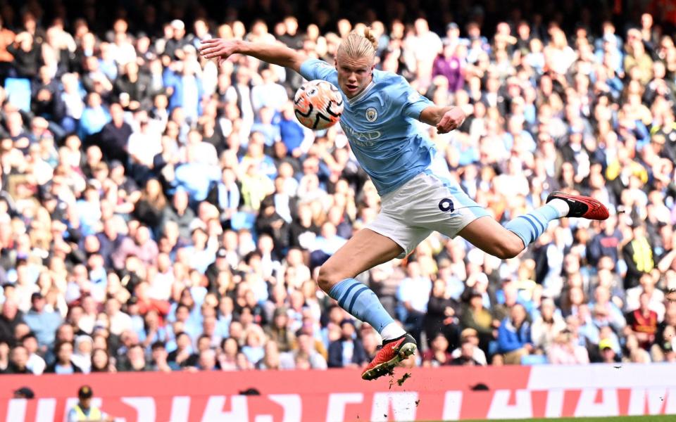 Erling Haaland in mid volley