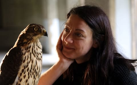 Helen Macdonald with Lupin, the new hawk she trains in a BBC documentary - Credit: BBC