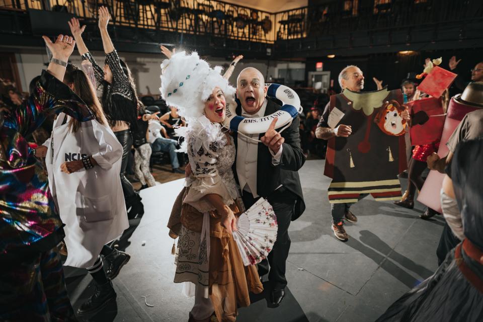 Costume prize-winner Jackie Reeves, left, and David Kuehn, executive director of Cotuit Center for the Arts, join revelers at a past Arts & Soul Ball at Cotuit Center for the Arts.