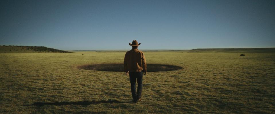 Royal Abbott (Josh Brolin) approaches the mysterious hole in the middles of his remote Wyoming pasture.